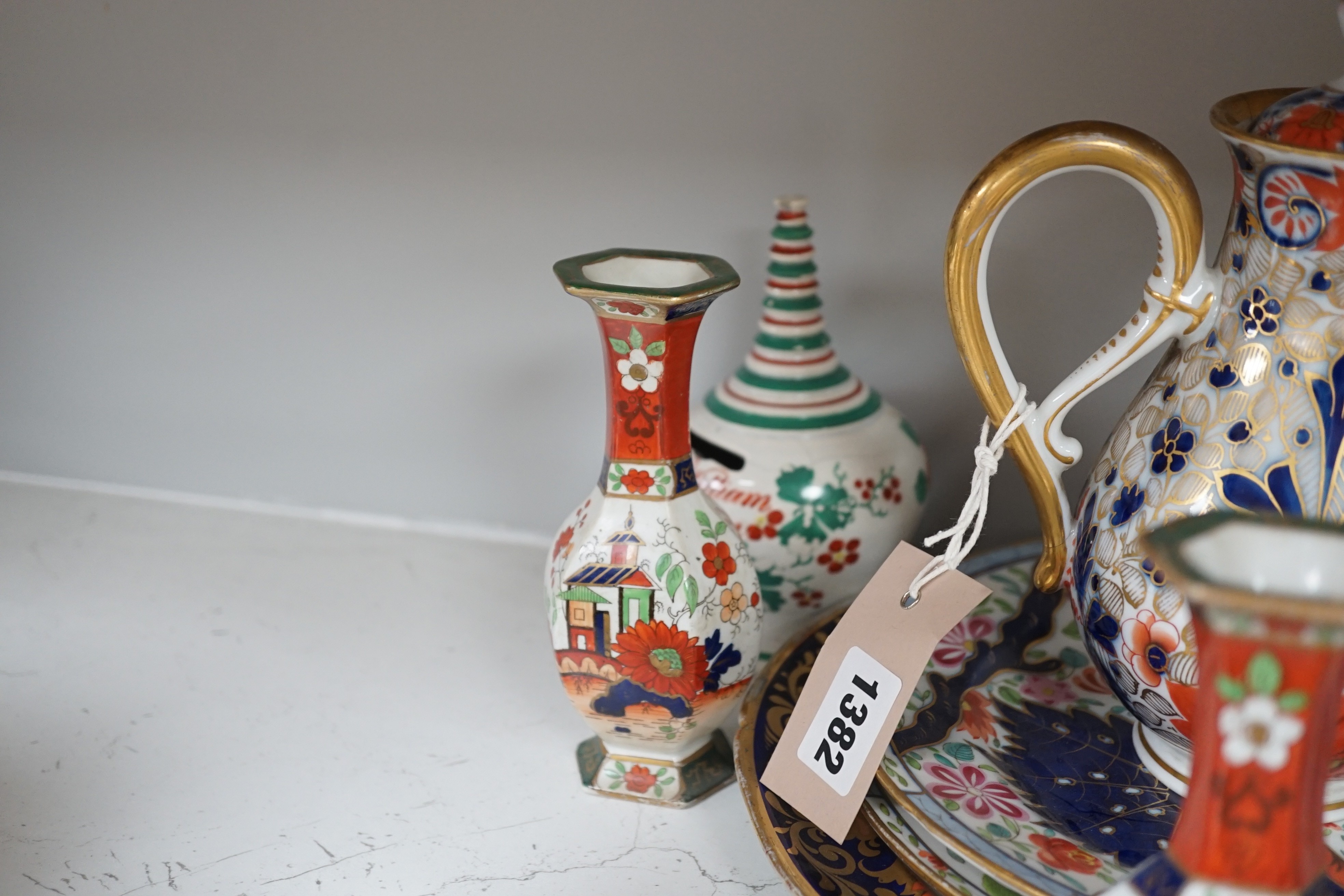 A selection of English porcelain and ceramics, to include a two handled Wedgwood Queensware urn, cover and stand, c.1800, two 19th century Worcester pierced bordered dishes, etc.